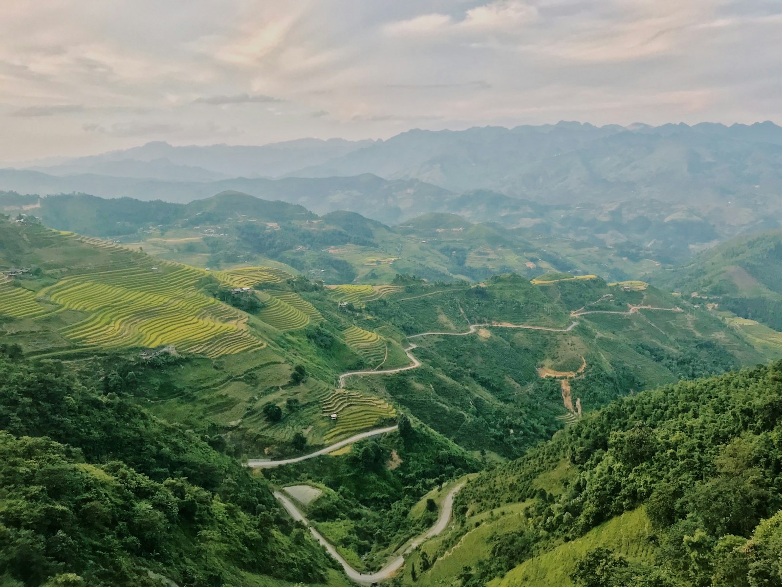 The Mã Pí Lèng Pass winding through limestone mountains in Hà Giang